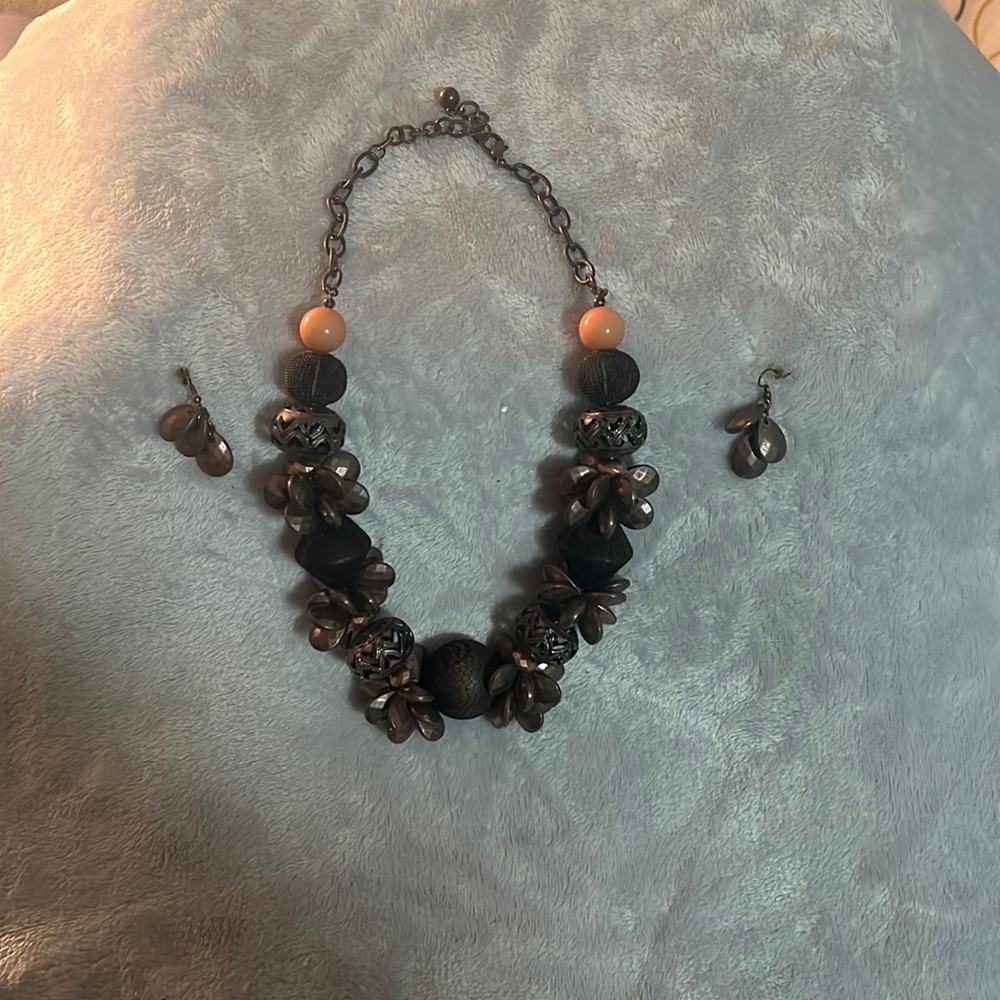 Brown necklace with also coral beans as well with matching dangling earrings